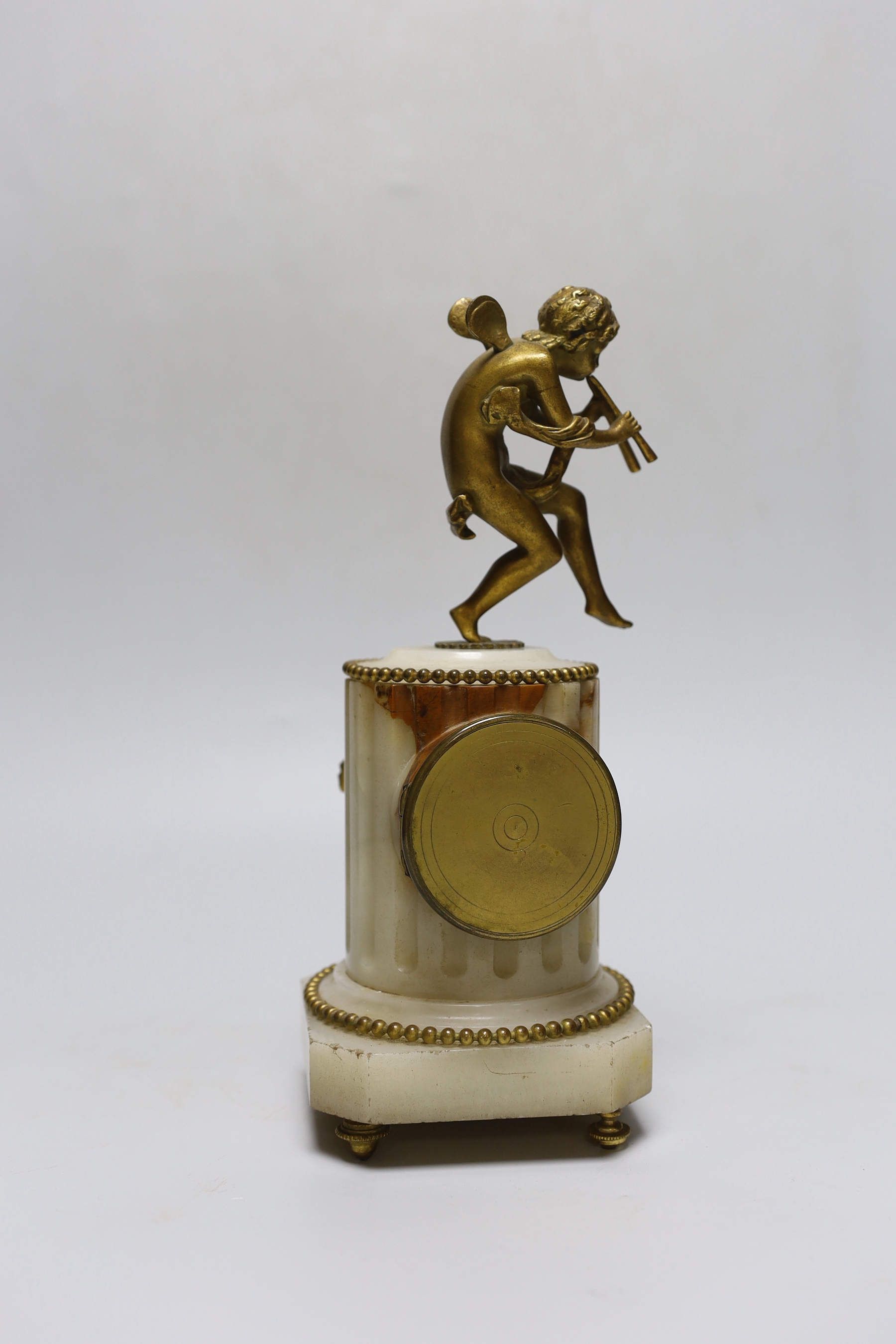 A late 19th century French ormolu mounted onyx mantel clock, 25cm